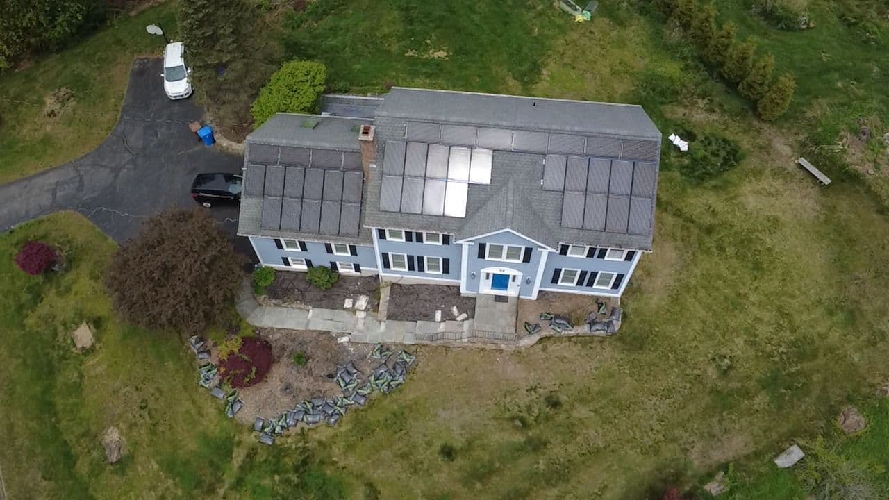Solar Panel Removal and Reinstall on a New Roof in Redding CT image